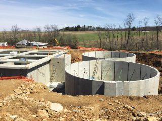 Using precast concrete products helped general contractor Global Heavy Corporation successfully navigate on-site space constraints while also allowing for a quicker installation.